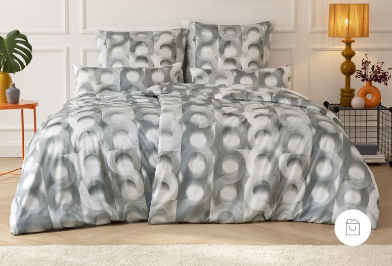 Bettwäsche aus Schweizer Premium Satin mit modernem, grafischem Kreis-Muster in verschiedenen Grau- und Silbertönen – edel schimmernd.