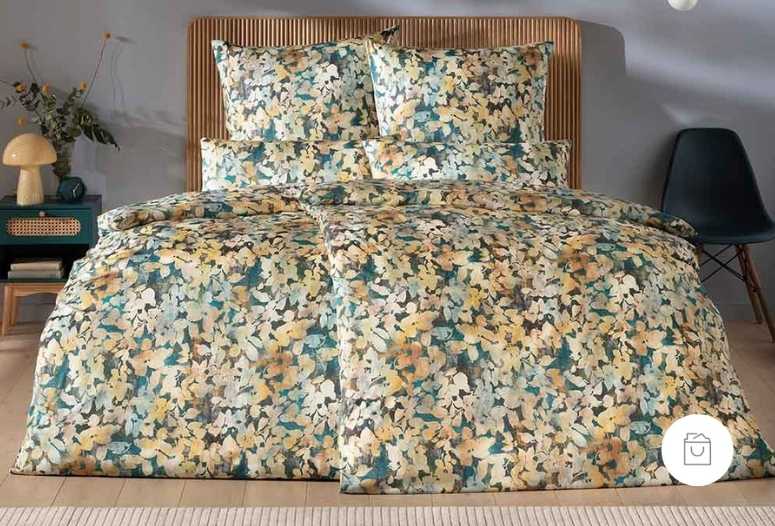 Jersey-Bettwäsche mit überlappenden Blättermuster in der Farbe Multicolor (Farbkombination aus Gelb, Grün, Creme und Braun mit herbstlichem Charakter). 