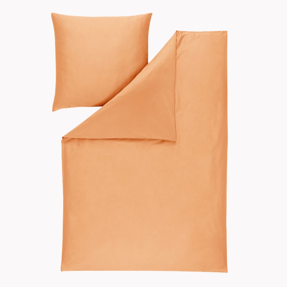 Komplettansicht der Uni-Bettwäsche Valetta in apricot (warmes, helles Orange)